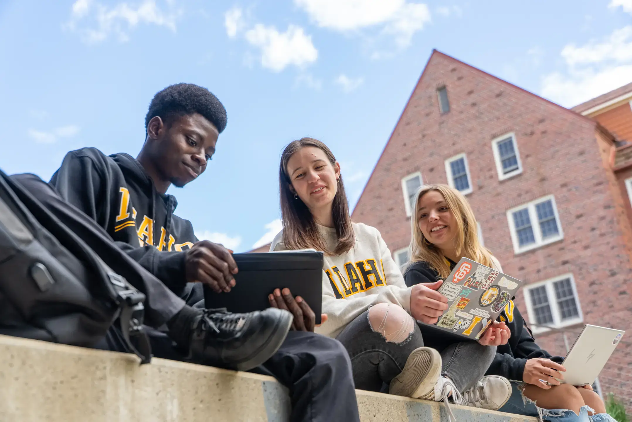 Students study and socialize outside the Integrated Research and Innovation Center (IRIC) on Monday, May 5, 2025.