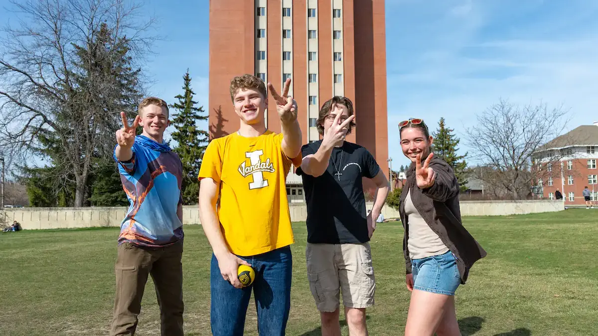 Students throw the V as they gear up for the fall semester