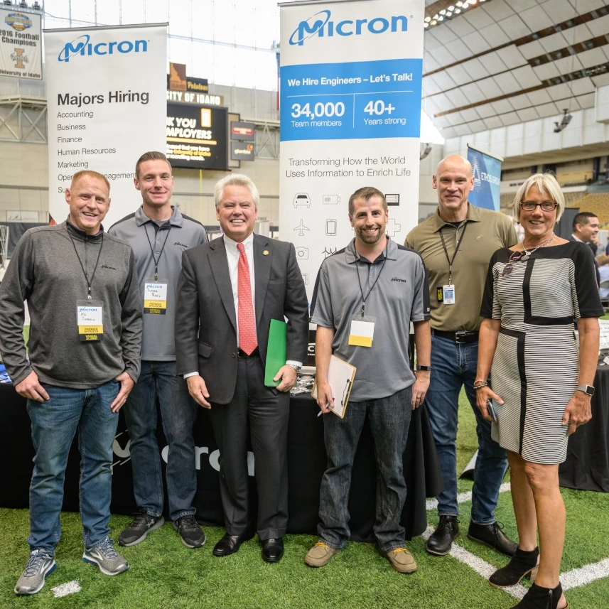 Professionals stand for a group photo with Scott Green