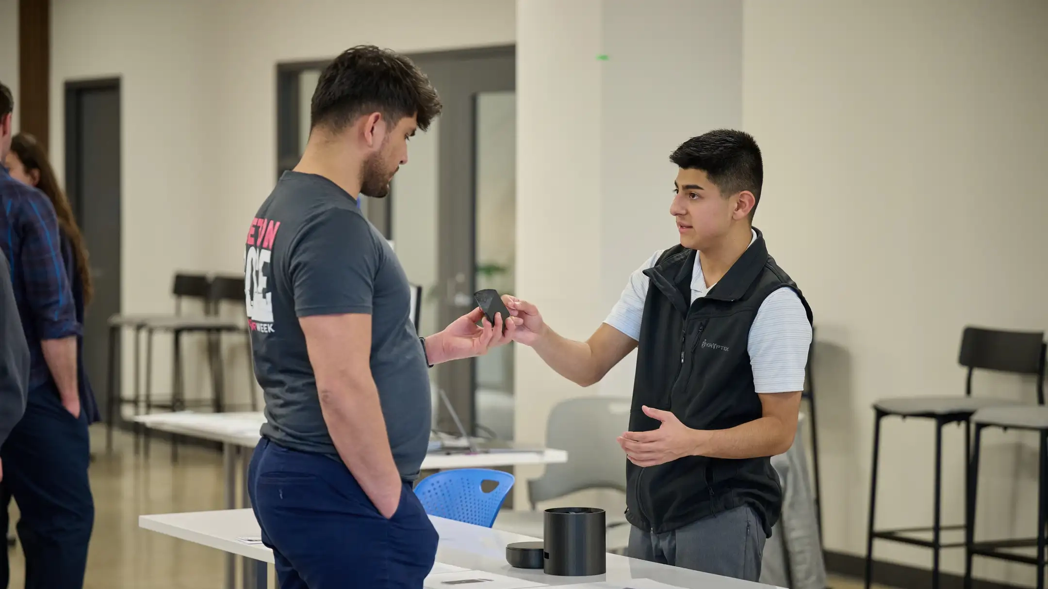 Ӱֱ student Ismael Valadez describes the Medi-Mate to attendees of the Idaho Entrepreneur Challenge in Boise on April 3, 2025. He and classmate Austen Reagan have developed the automatic medication dispenser which controls when and how often medications are given.