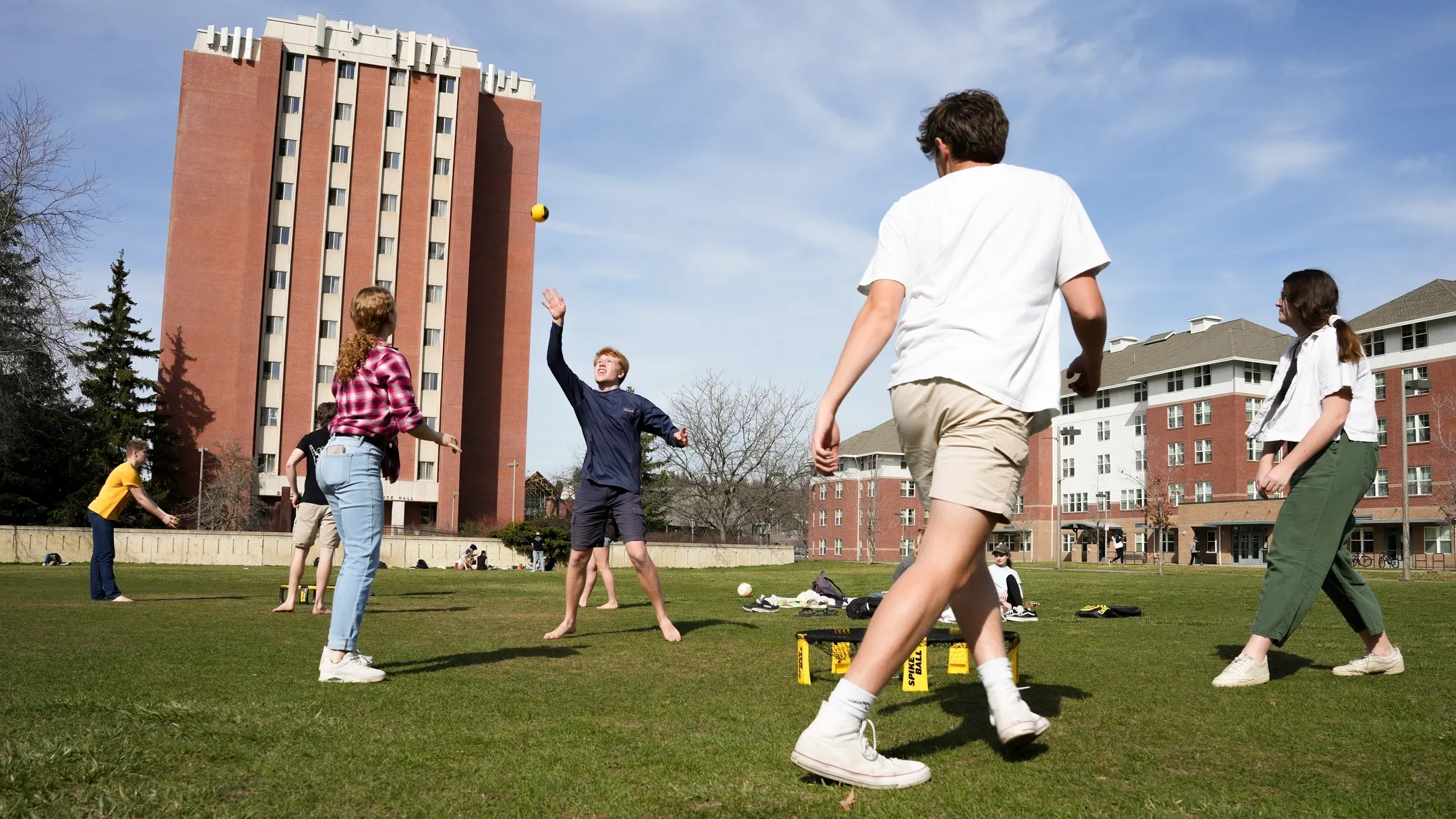 Student playing spike ball on the Tower Lawn.