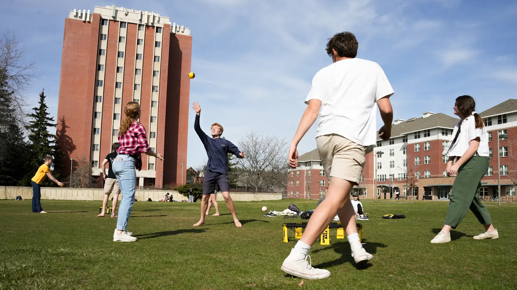 Student playing spike ball on the Tower Lawn.