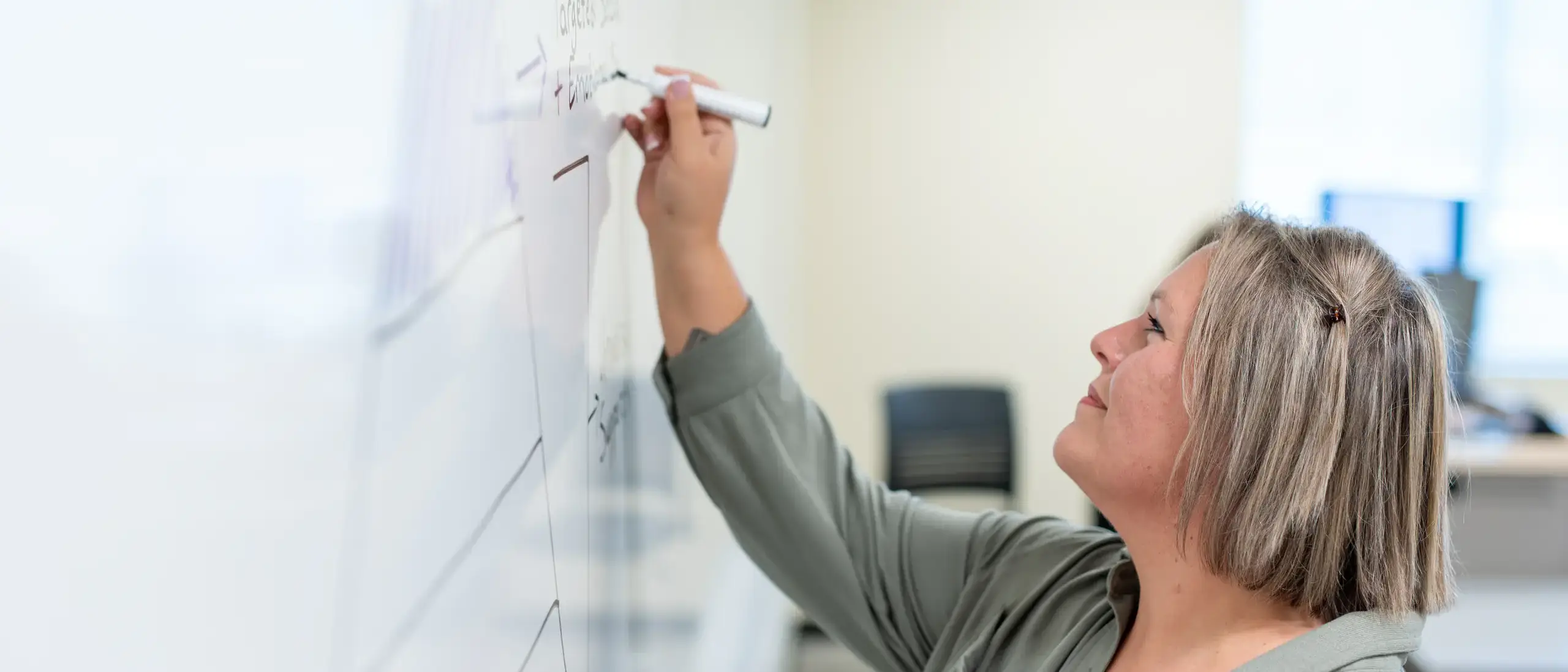 Angie Presley, a student in the Child Development and Early Childhood Education B.S. programs, is pictured in a classroom in the DeArmond Building at the University of Idaho Coeur d'Alene campus on Wednesday, September 10, 2025. She and classmates were discussing concepts from their ECDE-3400: Parent-Child Relationships/Family &amp; Communications course. 