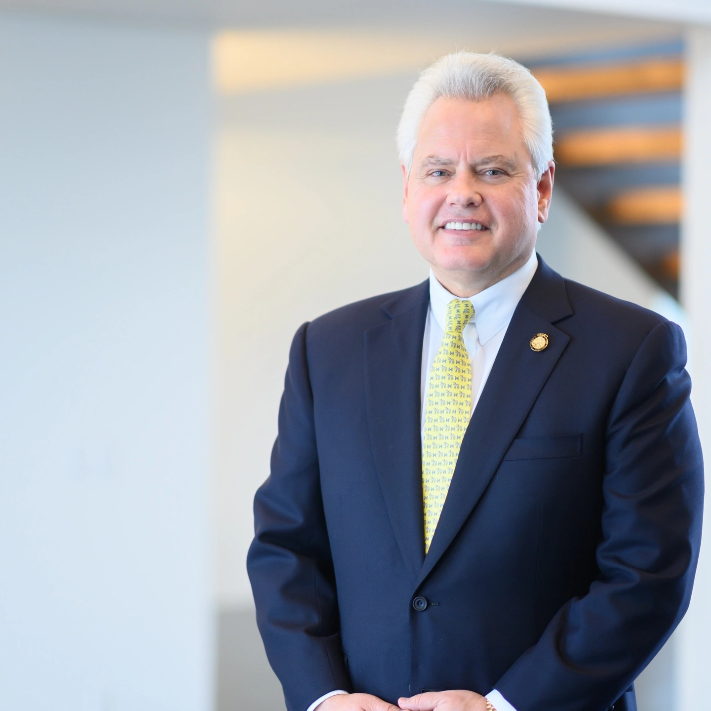 Scott Green, university president, man in business attire smiling