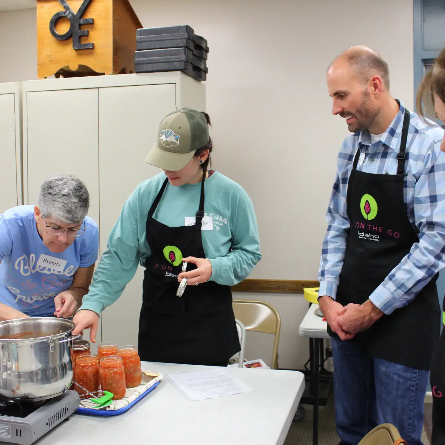 Folks taking a canning class.