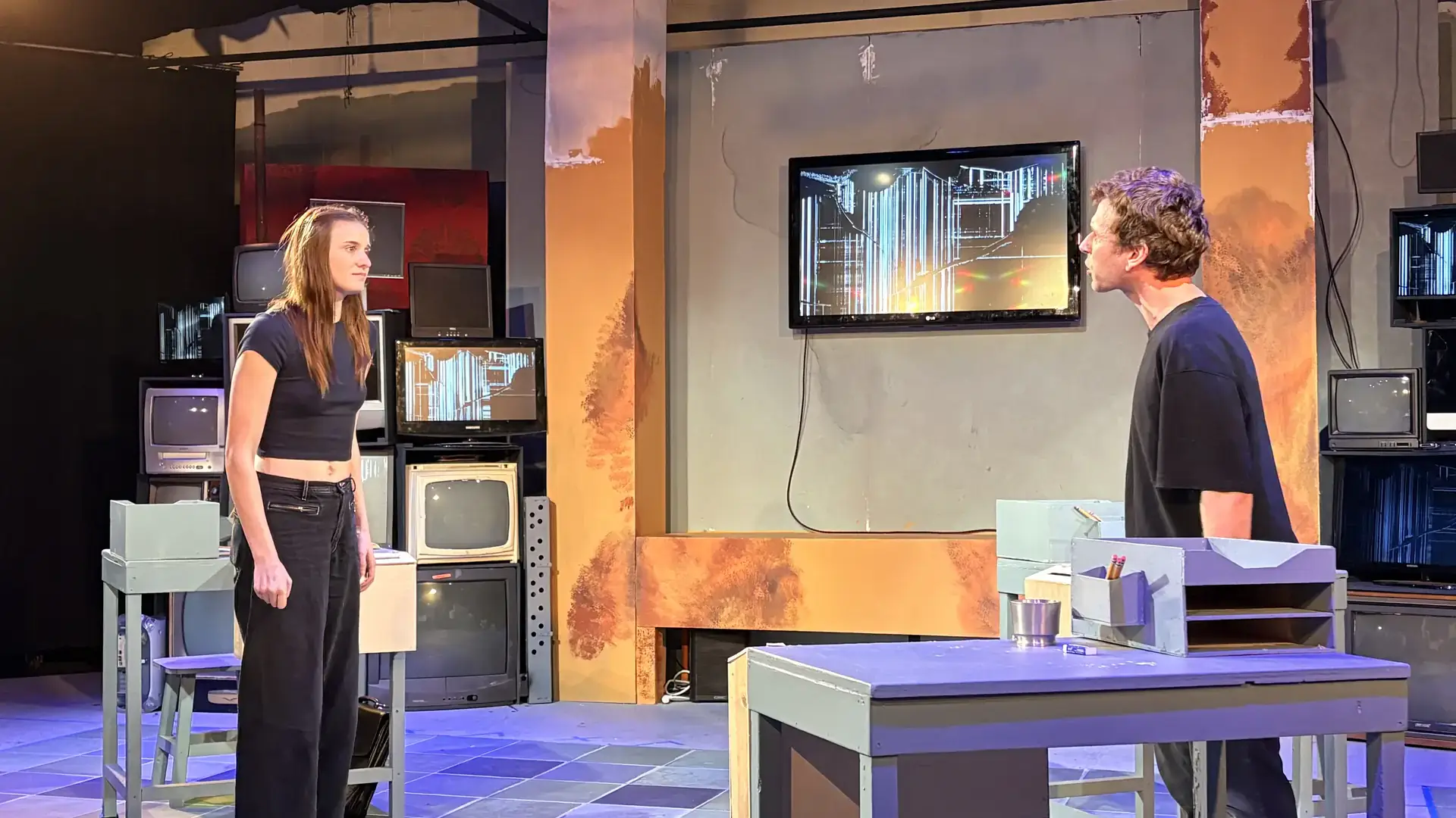 Bryce Gowey and Cambree Miller rehearse “1984” in the Forge Theatre.