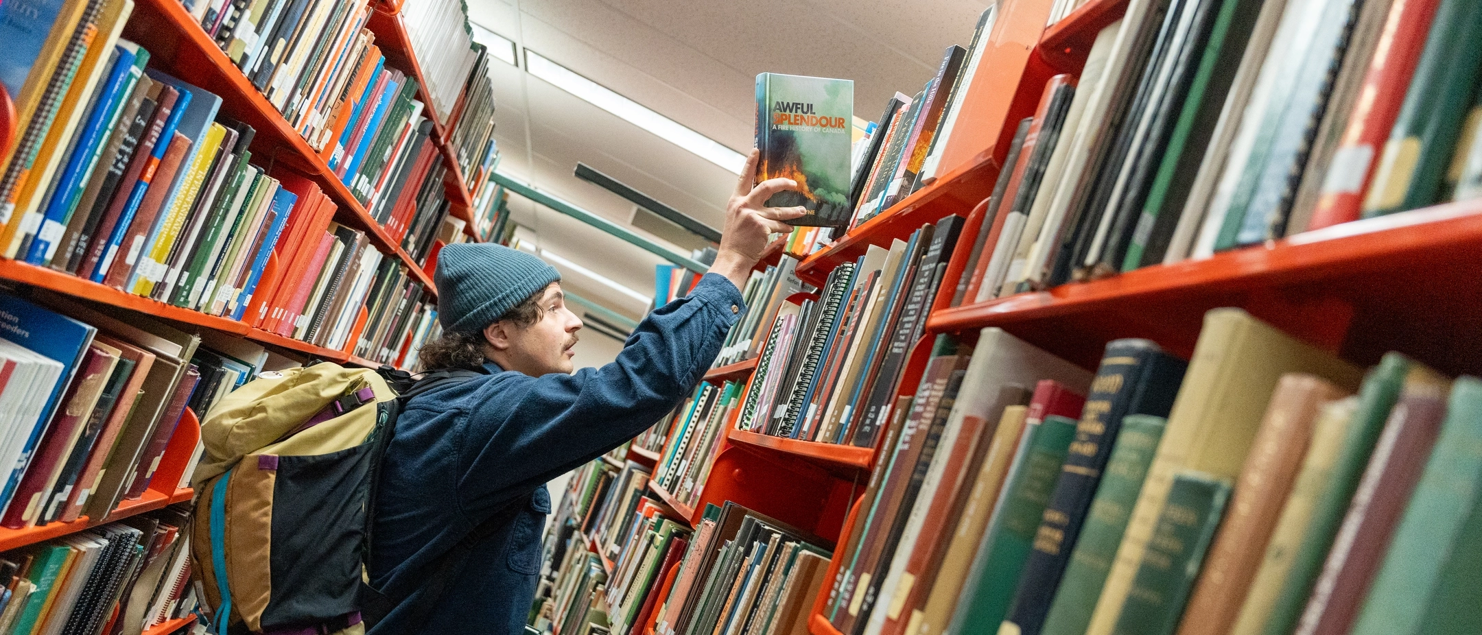 Michael Decker, a grad student, documenting the rich history of fire lookouts in the American West in the Library archives.