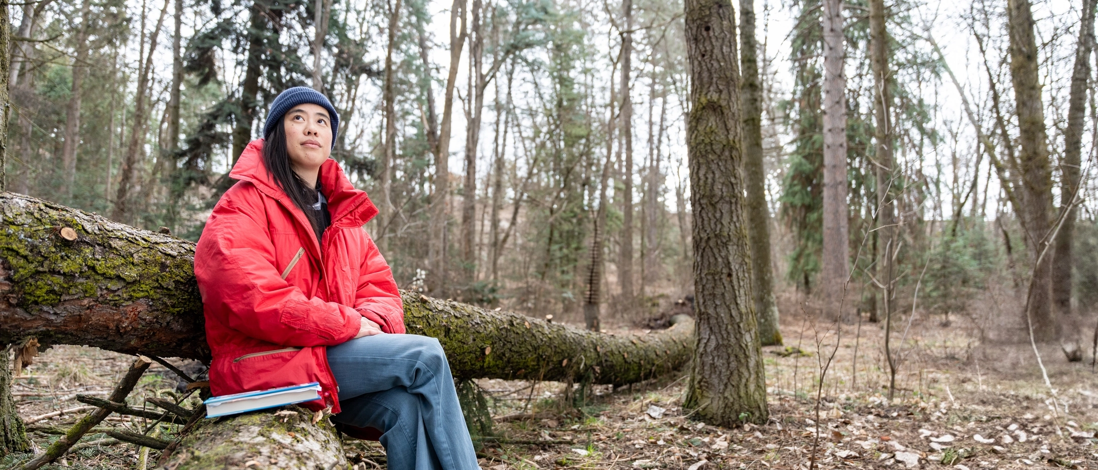 Jennifer Yu, a M.F.A. Creative Writing student, is photographed at the Shattuck Arboretum on March 18, 2025. Yu is the author of three novels, including “Grief in the Fourth Dimension”. 