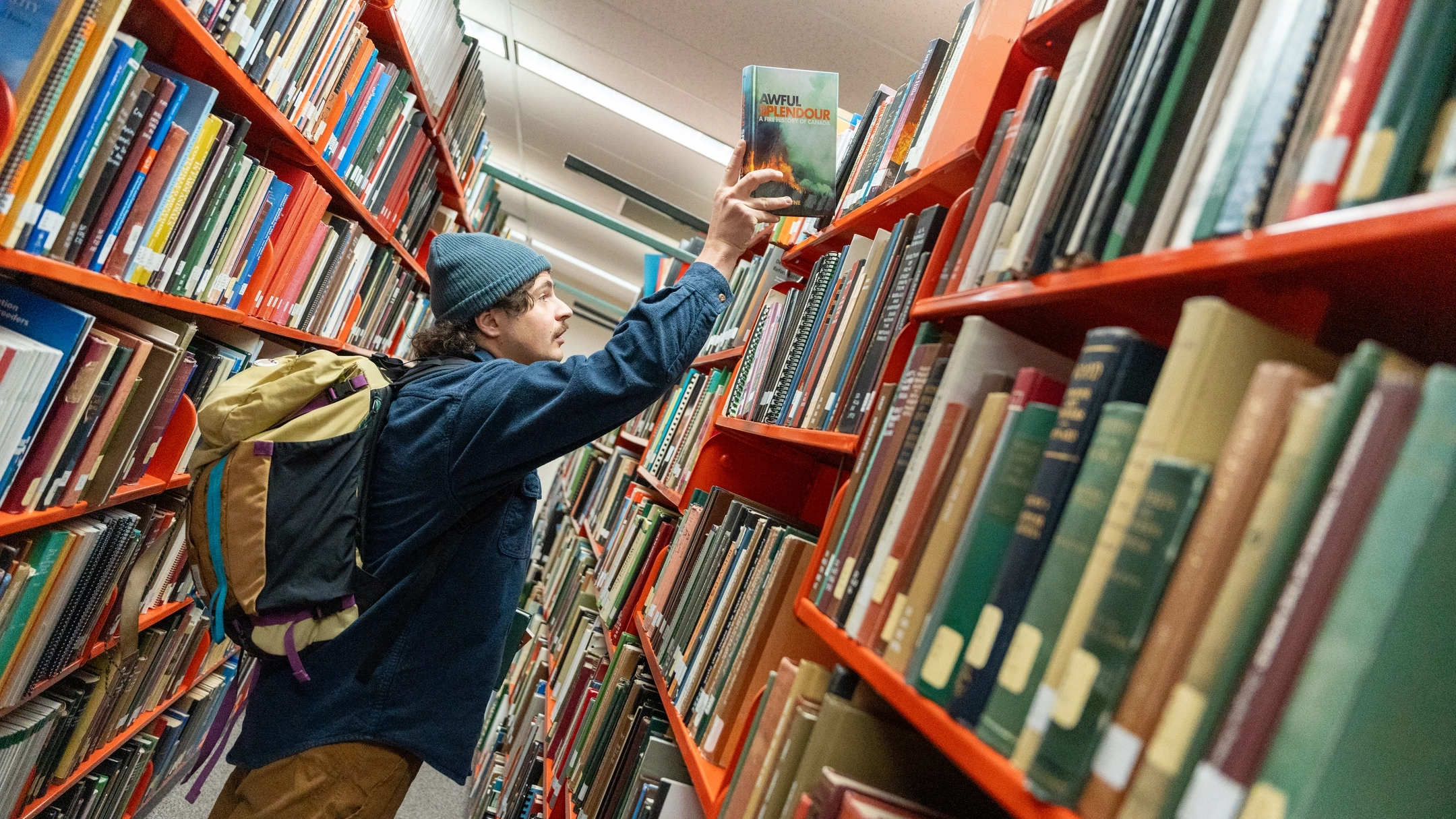 Michael Decker, a grad student, documenting the rich history of fire lookouts in the American West in the Library archives.