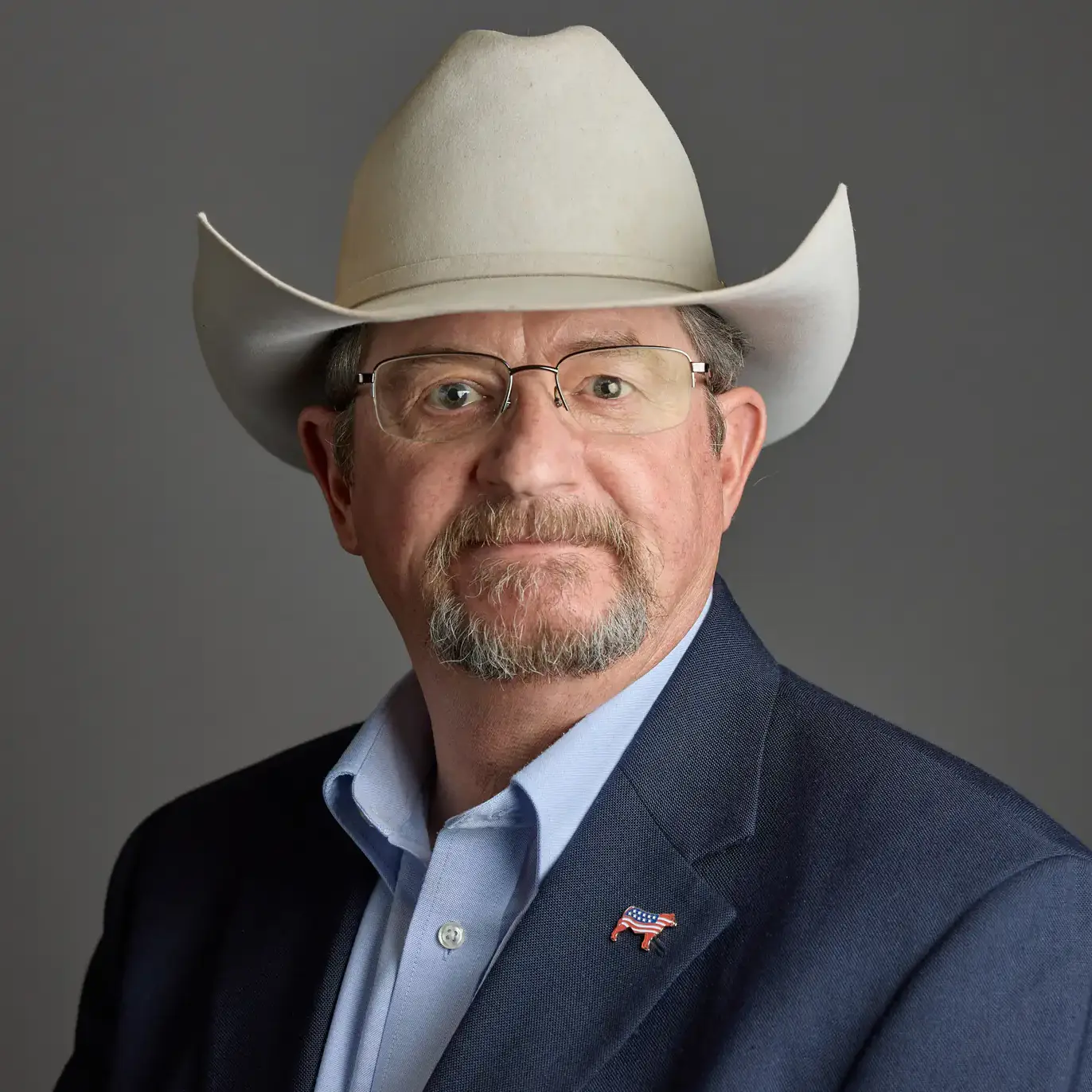 A portrait of John B Hall in 2026