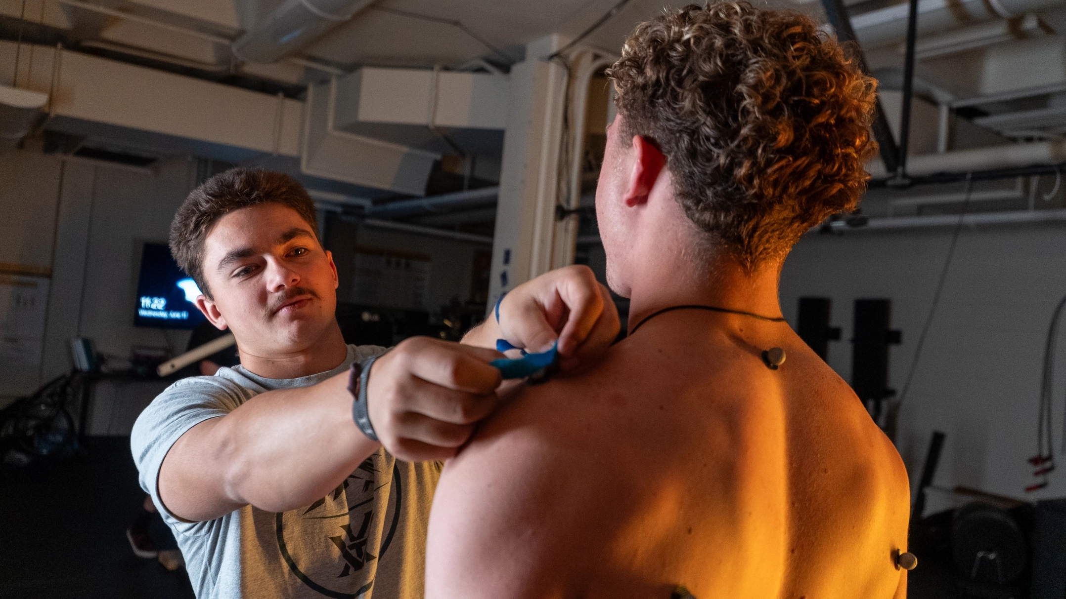 Jared Hanchey does movement science research with Joshua Bailey on Wednesday, June 11, 2025 at the Integrated Sports Medicine Movement Analysis Laboratory in the Physical Education Building. Hanchey is studying the effects of isometric and generalized warmups for deadlift performance.