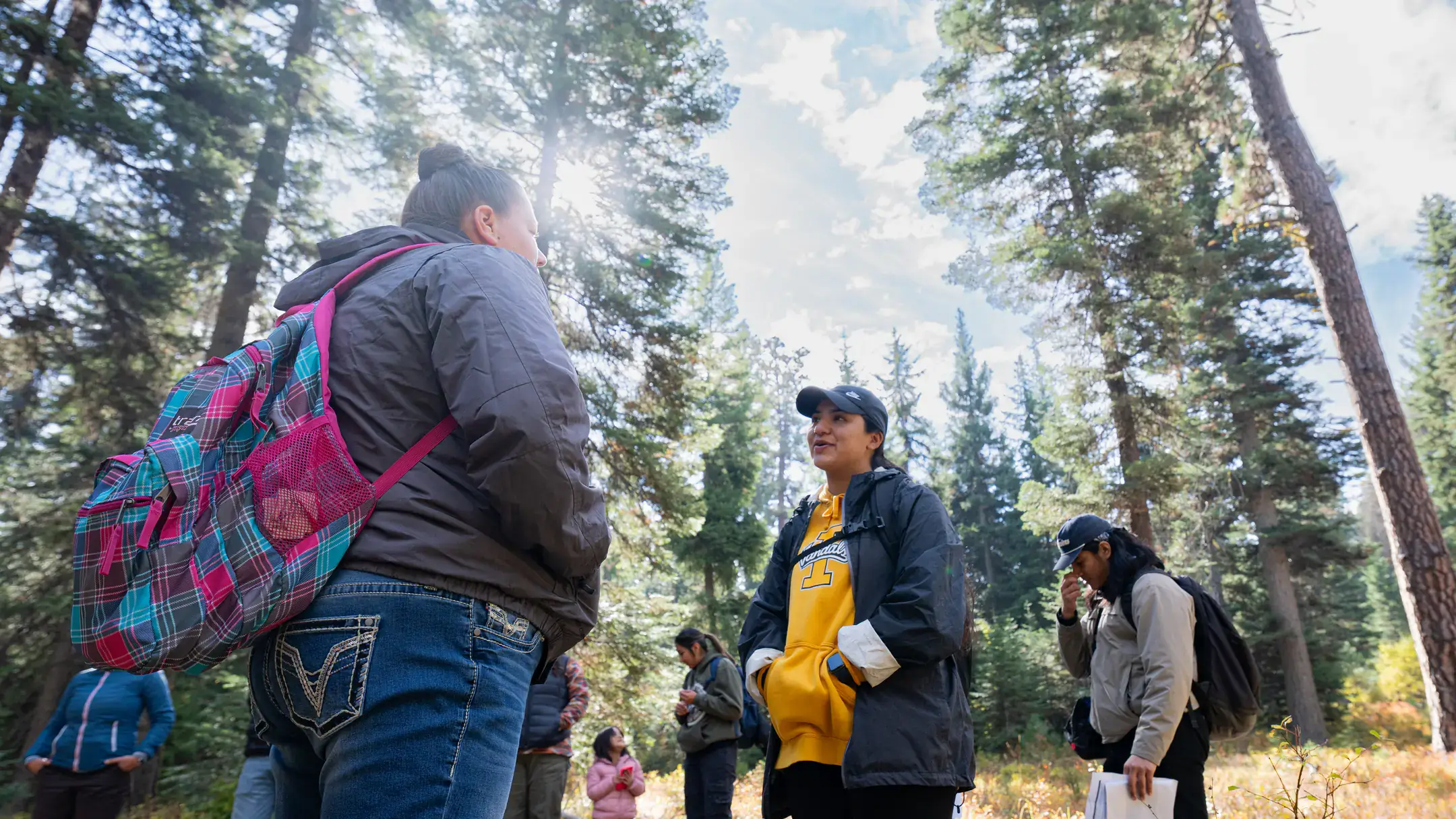 Photos of College of Education, Heath and Human Sciences Indigenous Knowledge for Effective Education Program (IKEEP) and Cultivating Indigenous Research Communities for Leadership in Education (CIRCLES) students at the McCall Outdoor Science School (MOSS) campus.
