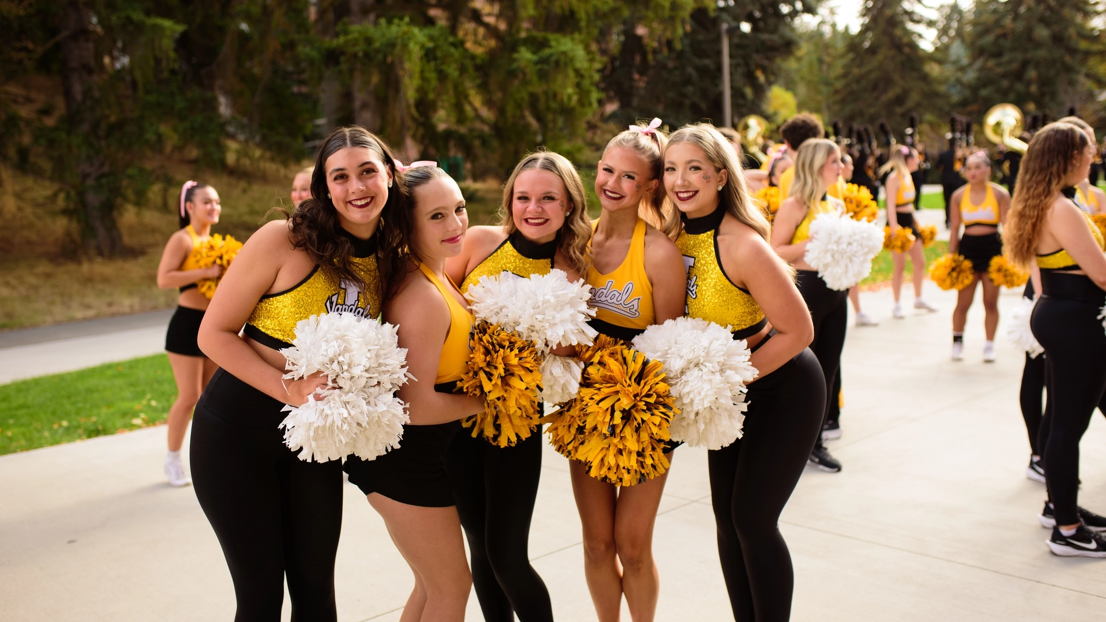 University of Idaho cheerleaders pose before a game