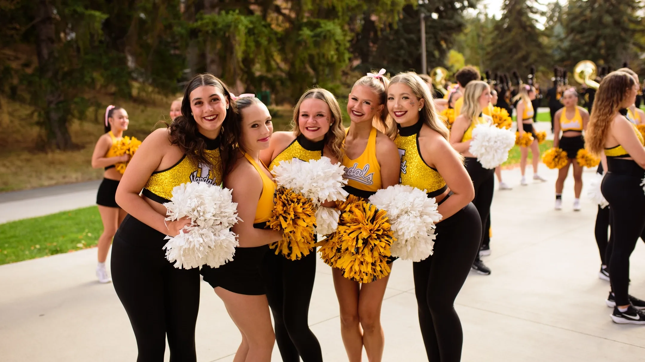 University of Idaho cheerleaders pose before a game