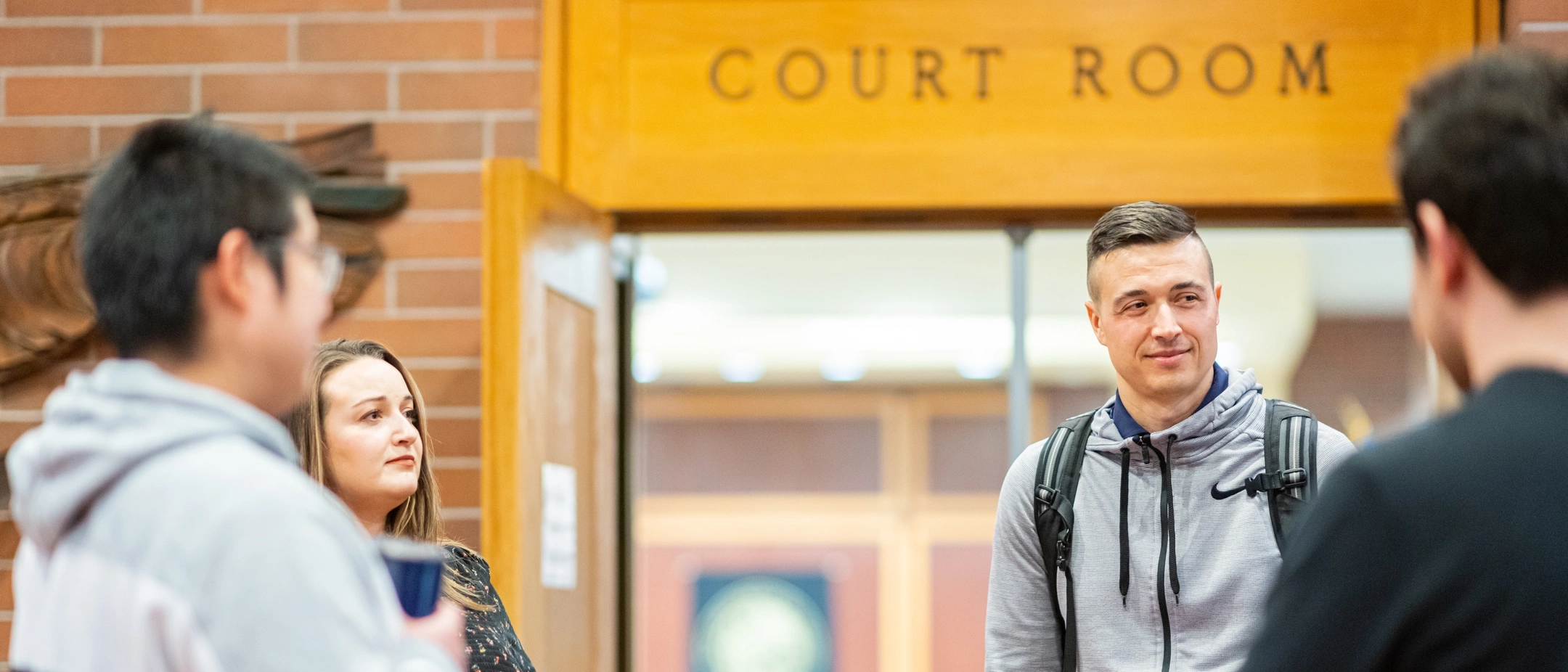 Ӱֱ College of Law stock images of students in the Menard Law building