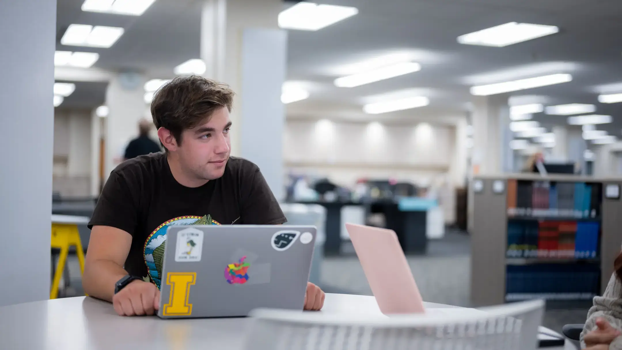 Students make us fo the University of Idaho Library 1st floor talking area.