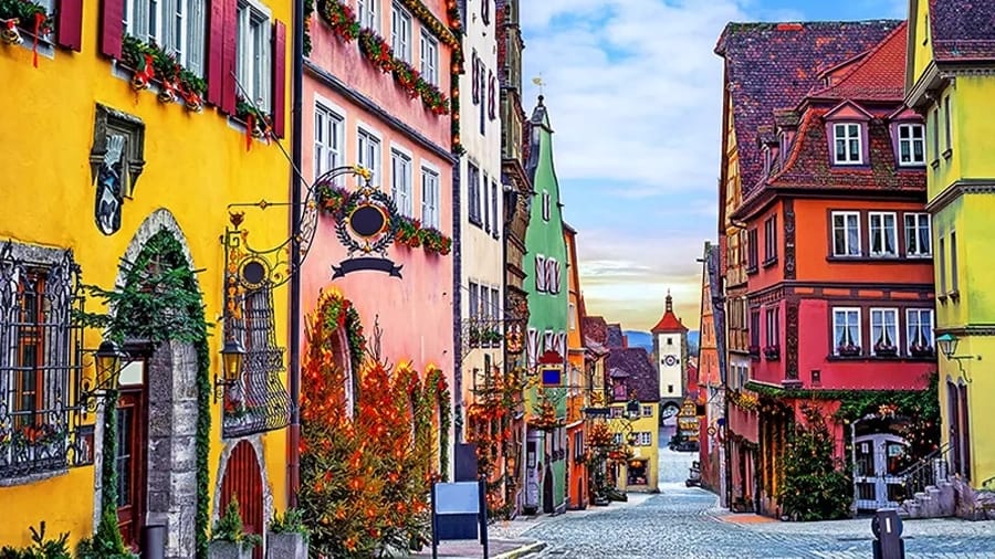 Colorful buildings along a brick road in a German village