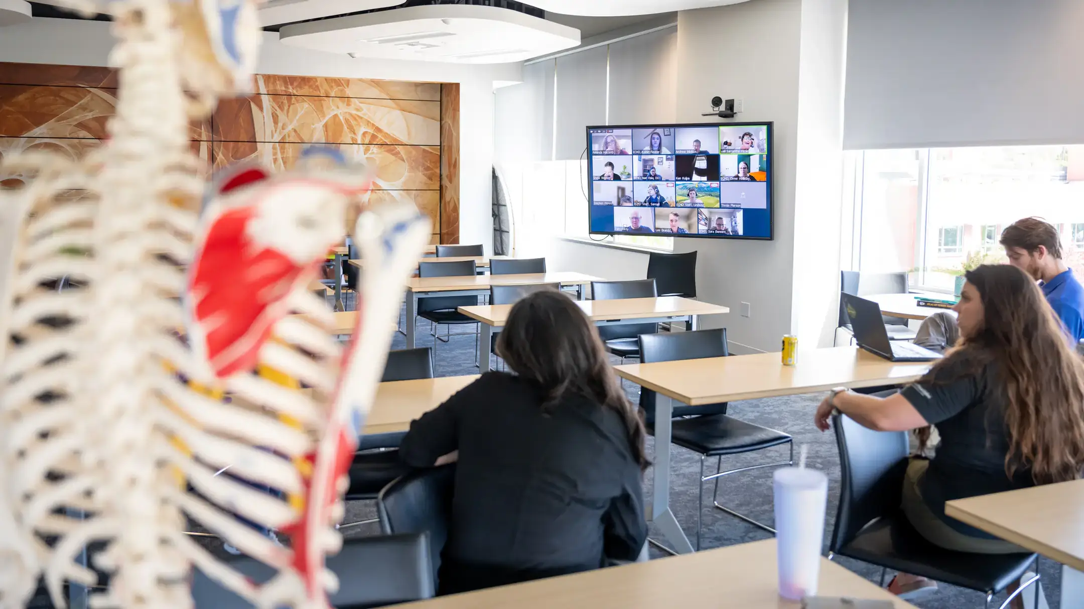 WWAMI Medical Education Program "action shots" of people interfacing with technology to illustrate the virtual education component of our ECHO Idaho program.